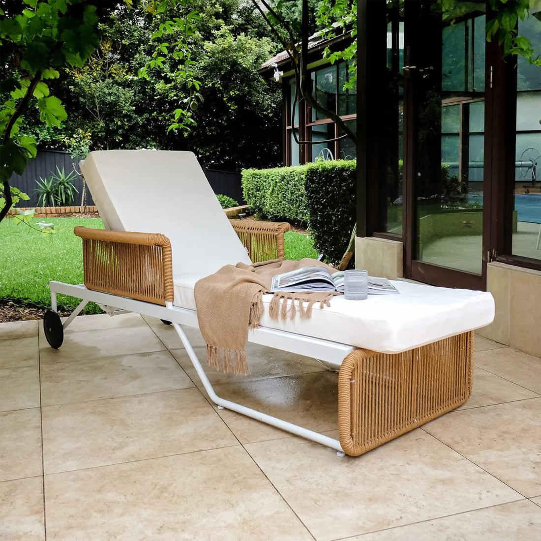 Beyond Living outdoor rattan sun lounger for poolside lounging