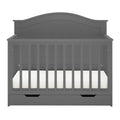 Convertible wooden baby cot nursery setup