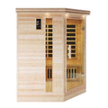 Luola barrel sauna exterior view with Harvia stove by Beyond Living
