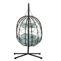 Wicker hanging basket chair patio setup