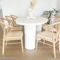 contemporary curved outdoor dining table concrete design