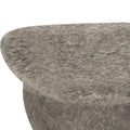 large round concrete patio coffee table in stone finish