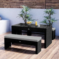modern outdoor dining set with table and bench seating