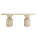 modern oval outdoor concrete dining table beyond living